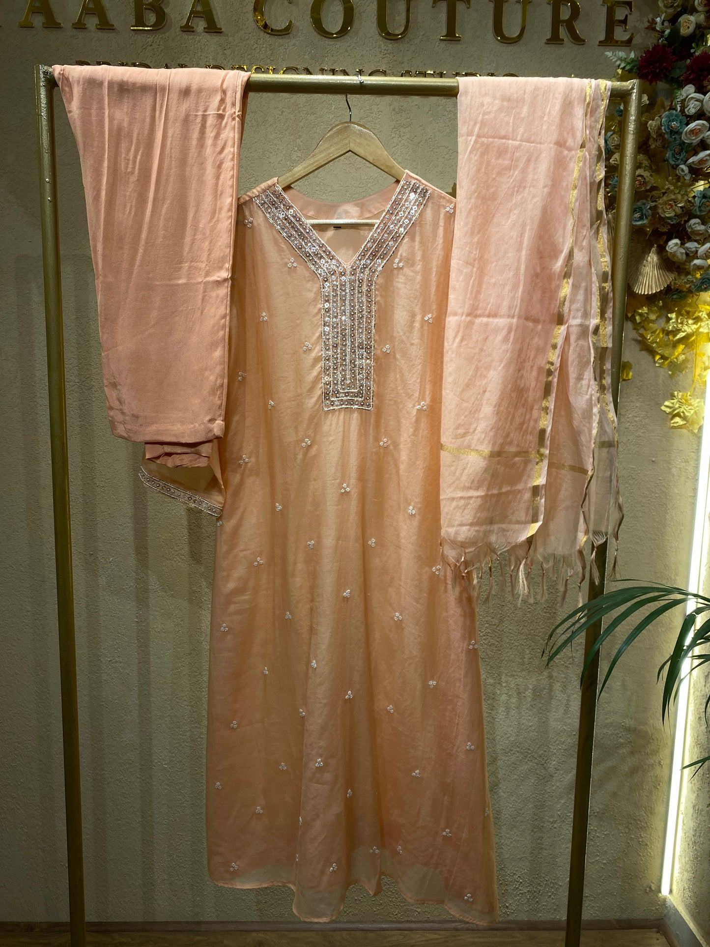 peach colour suit