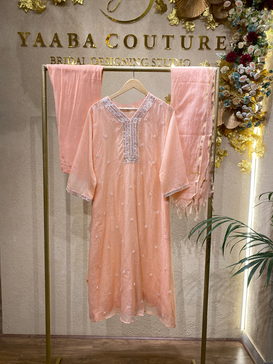 peach colour suit