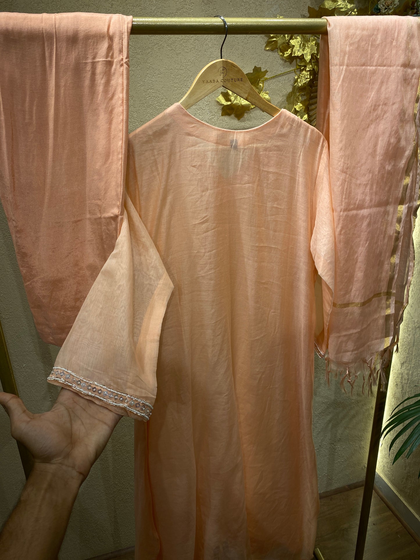 peach colour suit