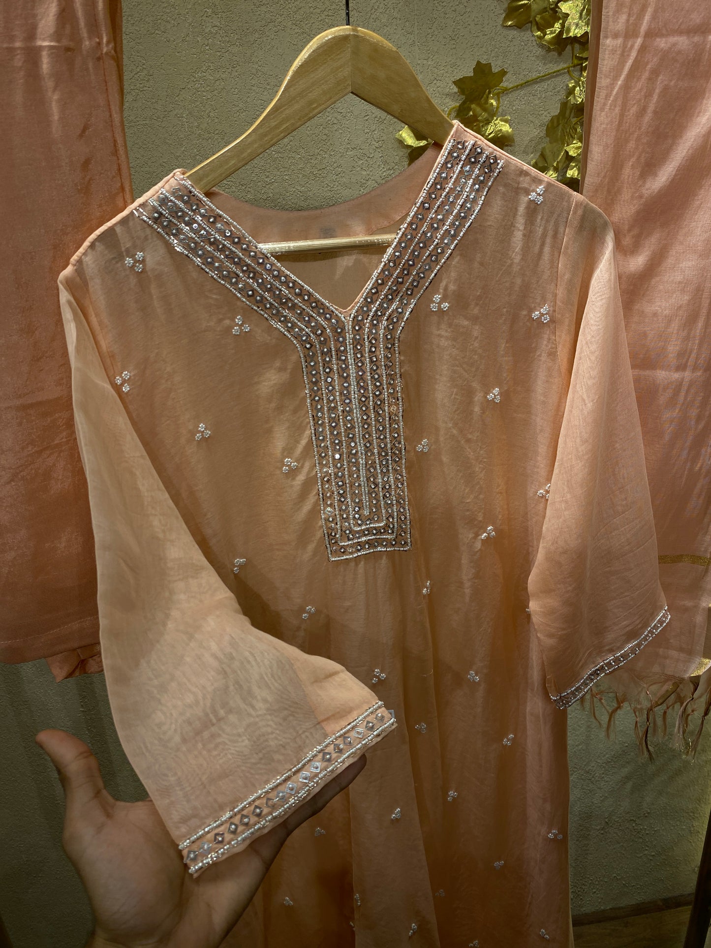 peach colour suit