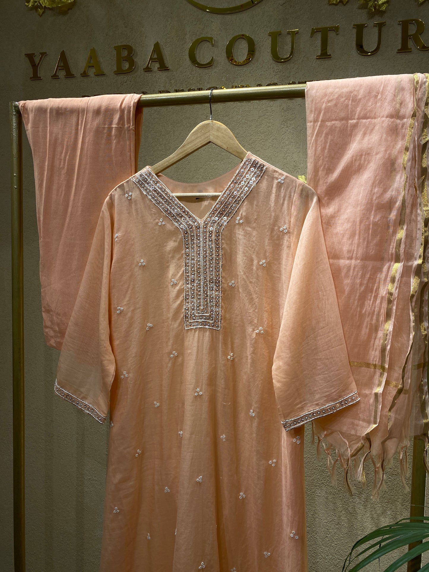 peach colour suit
