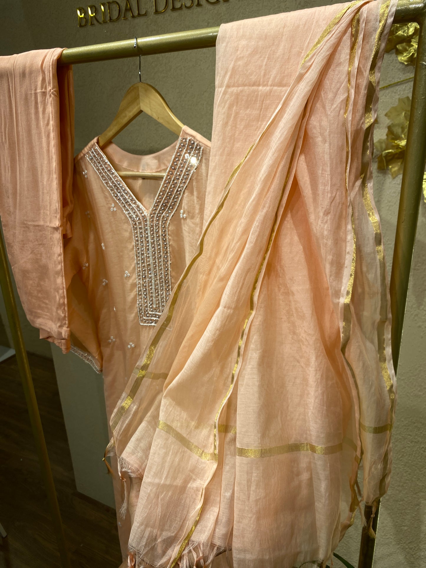 peach colour suit